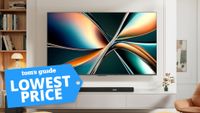 The Hisense U65QF, wall-mounted in a modern living space next to a blue-colored, superimposed tag that reads: "Tom's Guide Lowest Price"