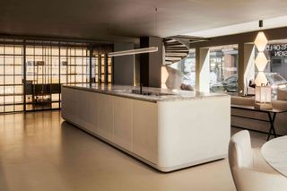 a sleek kitchen island in boffi's chelsea showroom in london