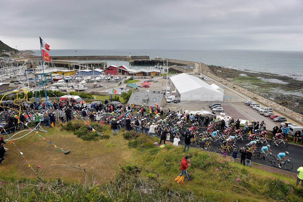 The peloton rides along the coast during stage 2 at the Tour de France