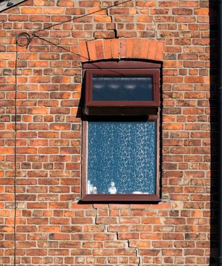 A window with cracks around it