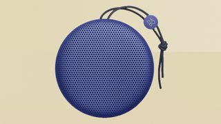 Bang & Olufsen Beosound A1 v2 blue speaker on yellow background