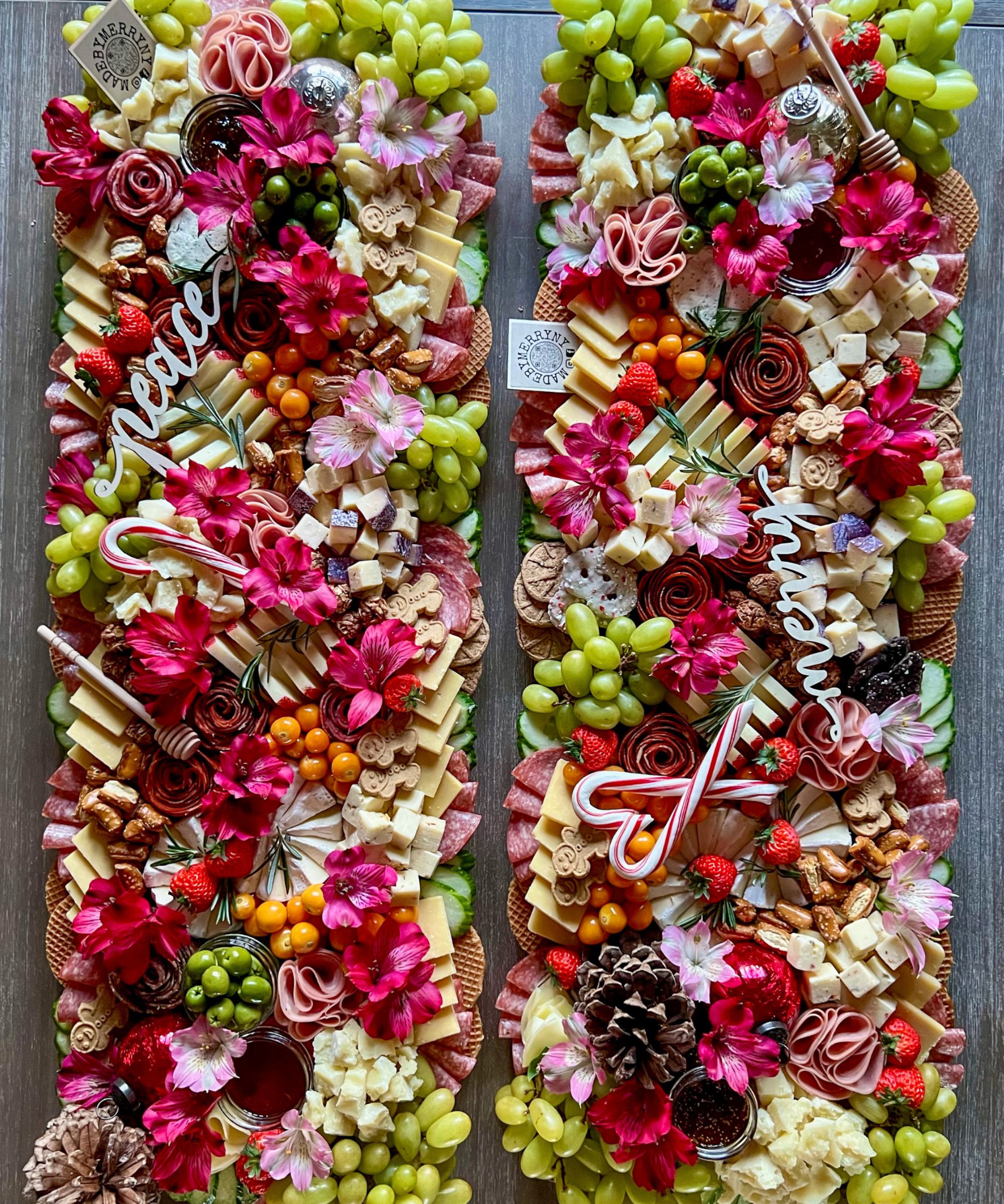 Grazing table with cheeses, meats, flowers and candycanes