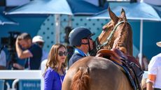 Henrik von Eckermann kisses King Edward on his muzzle after they parted company in the individual final at the Pais Olympics