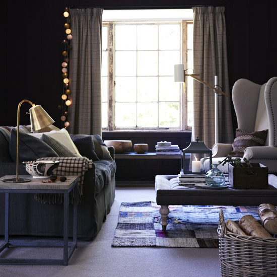 living room with sofa and white armchair