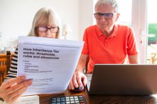 Senior couple looking at inheritance tax documents