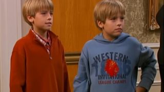 Dylan Sprouse and Cole Sprouse looking forward in The Suite Life on Deck.