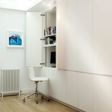 bed room with white cabinet