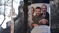 BUDAPEST, HUNGARY - MARCH 3: A campaign poster for the government's 'National Petition' displaying European Commission President Ursula von der Leyen, Ukrainian President Volodymyr Zelenskyy, and EPP President Manfred Weber is seen on a street in Budapest, Hungary, on March 3, 2026. The posters, which carry the slogan 'NEM FIZETUNK!' (We Won't Pay!), are part of a taxpayer-funded campaign by Prime Minister Viktor Orban's government to rally voters against EU financial aid for Ukraine ahead of the pivotal April 12 parliamentary elections. (Photo by STR/NurPhoto via Getty Images)