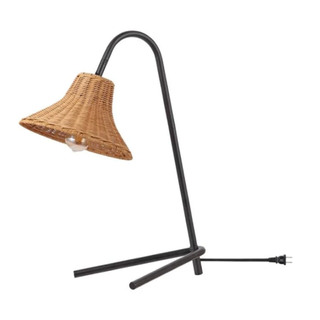 A rattan lamp with black base