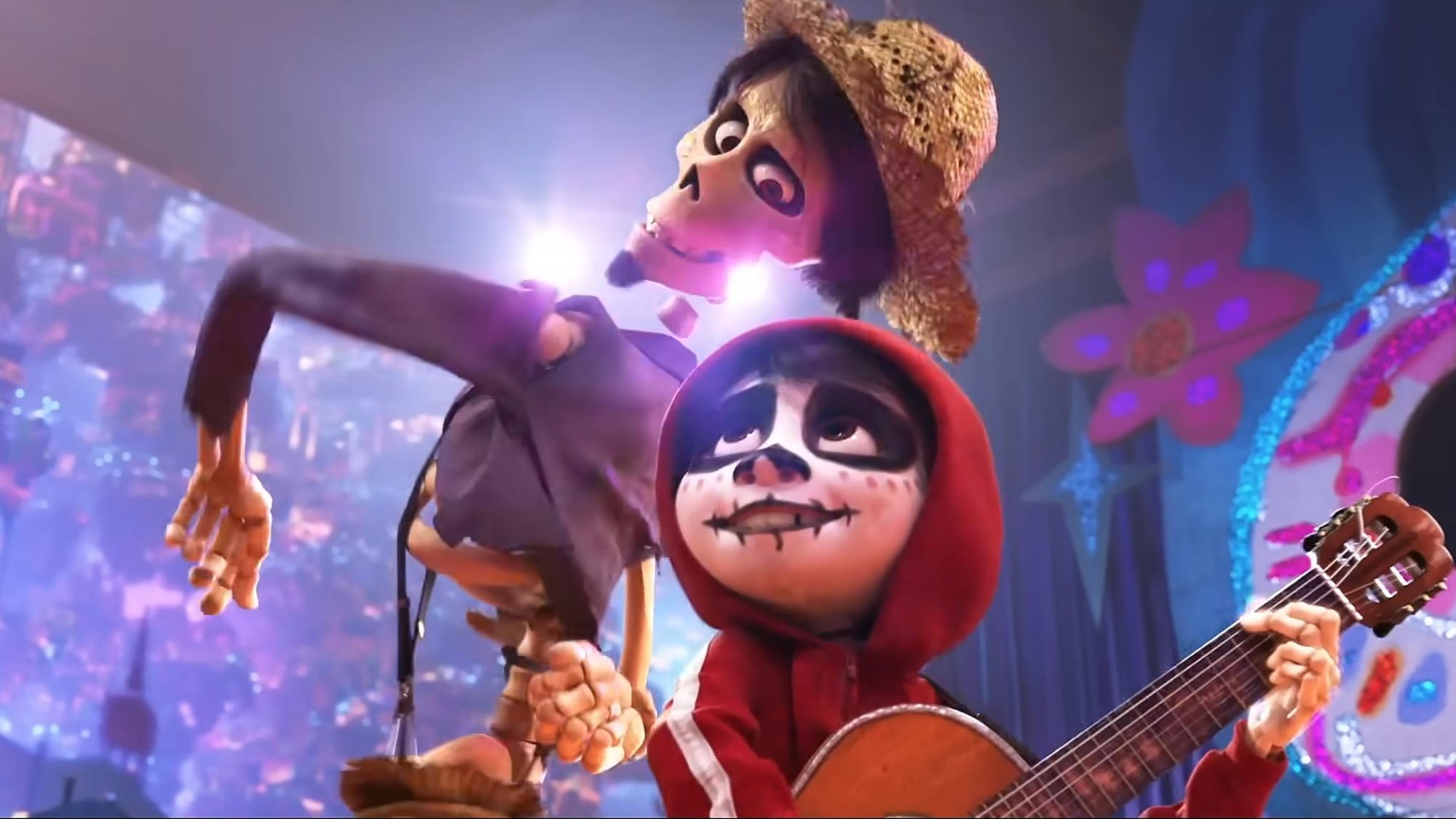 Miguel playing a song with his great-great grandfather in Coco