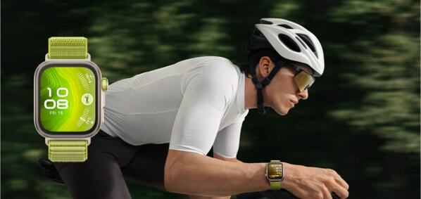 man riding bike with huawei watch beside him