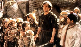 Hook Robin Williams stands with the Lost Boys