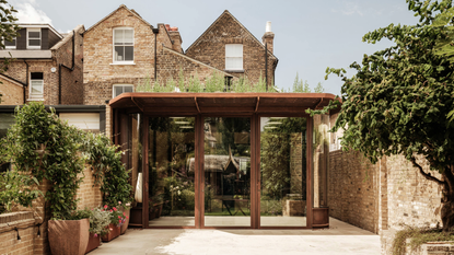 The Gallery house's Corten curves in London, by Cagni Williams Associates
