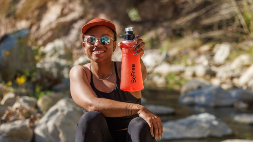 A woman holding the Katadyn BeFree AC 1.0 L Water Filter Bottle