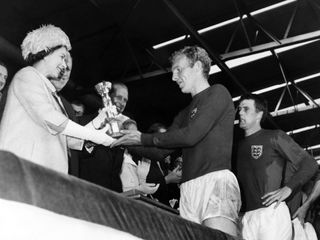 The Queen presents the World Cup to Bobby Moore