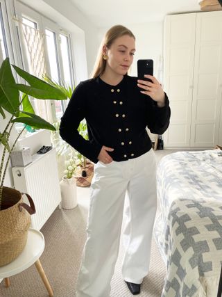 Florrie wears H&M white jeans