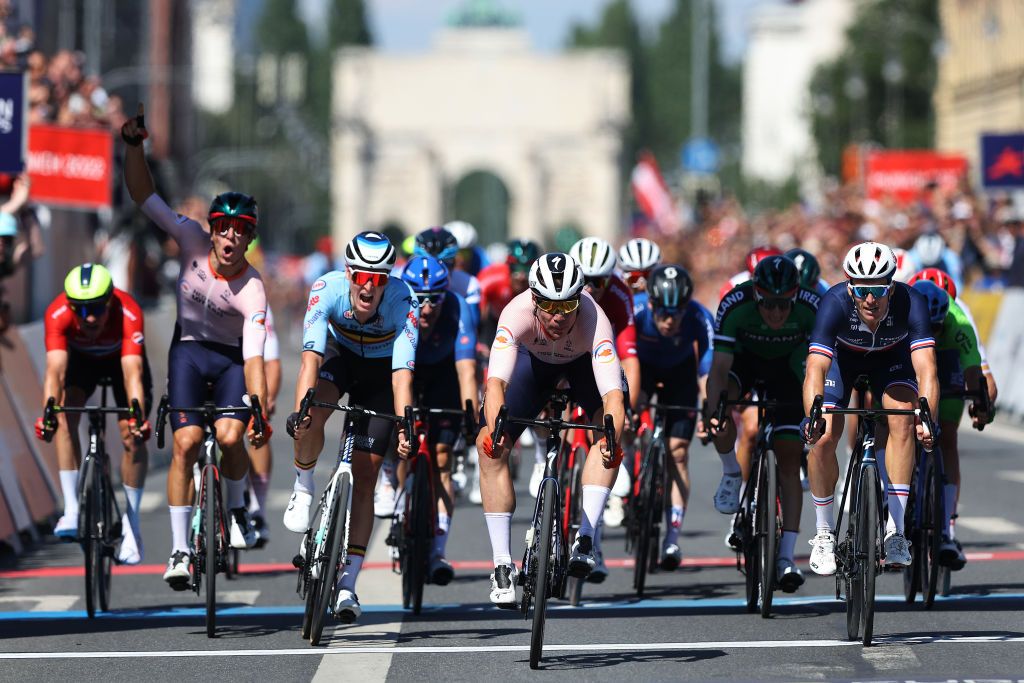 MURNAU GERMANY AUGUST 14 Fabio Jakobsen of Netherlands crosses the finish line to win Gold in the Mens Road Race competition on day 4 of the European Championships Munich 2022 on August 14 2022 in Murnau Germany Photo by Alexander HassensteinGetty Images