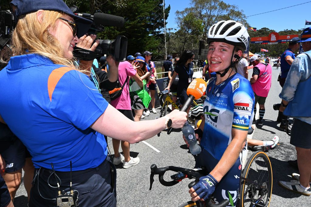 Stage and overall race winner Sarah Gigante (AG Insurance-Soudal) talks to the media