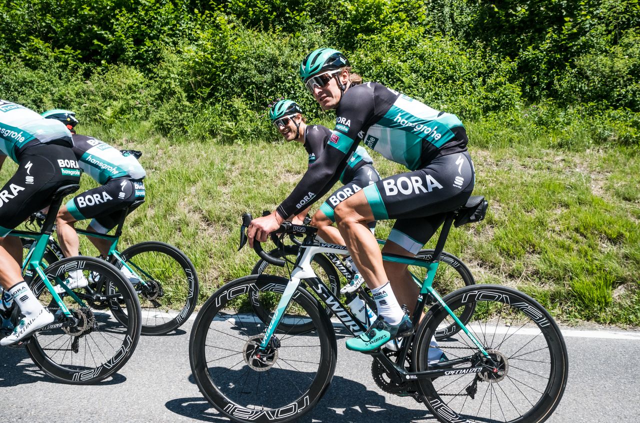 Bora-Hansgrohe on the road in the Alps.