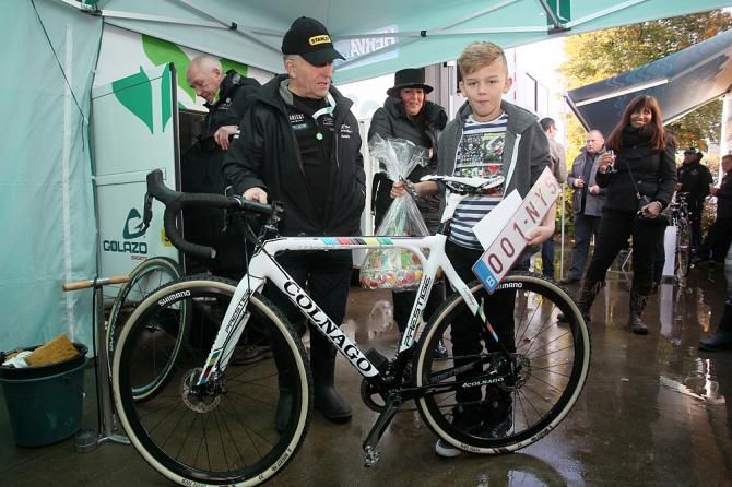 Sven Nys's mechanic plus son Thibau, who celebrated his 10th birthday on Sunday, pose with Sven's disc-equipped Colnago Prestige in Hamme-Zogge