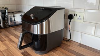 The side view of the Instant Vortex Plus 6-in-1 air fryer with ClearCook and OdourEase