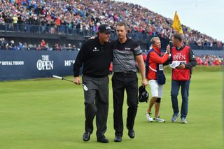 Henrik Stenson and Phil Mickelson embrace after the 2016 Open