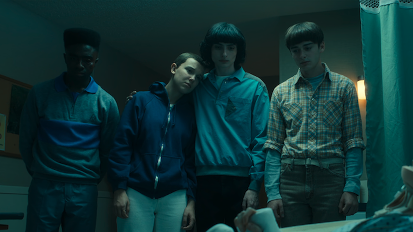 Lucas, El, Mike, and Will at Max&#039;s hospital bedside in Stranger Things Season 4x09