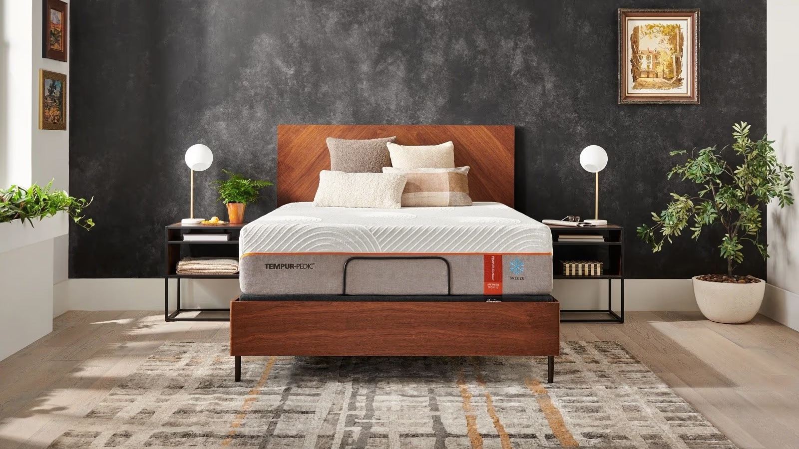 The Tempur-Pedic Tempur-Contour Luxe Breeze 1.0 mattress on a bed frame in a styled room