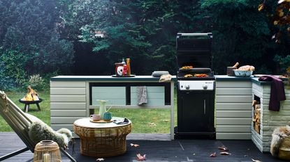 modern outdoor kitchen with bbq used in fall