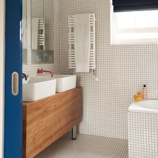 bathroom with mosaic tiles and wash basin