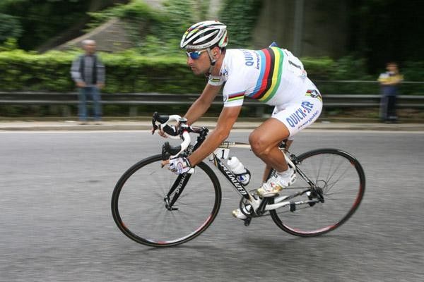 World Champion Paolo Bettini was happy to have a 'piano' day to heal his hurt rib.
