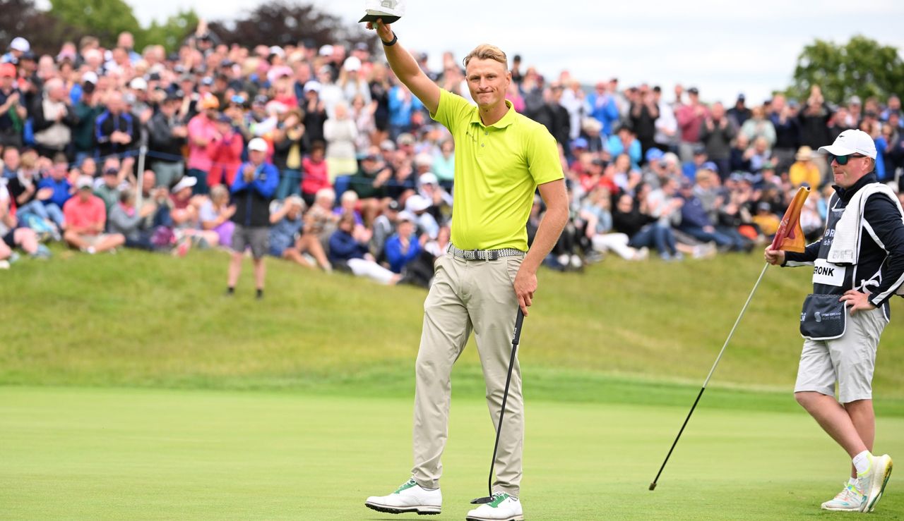 Meronk waves to the crowd following his victory at Mount Juliet