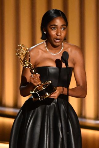 Outstanding Supporting Actress in a Comedy Series Ayo Edebiri, The Bear, accepts her award onstage during the 75th Emmy Awards.