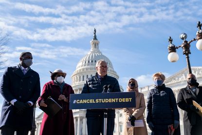 Lawmakers call on President Biden to cancel student debt.