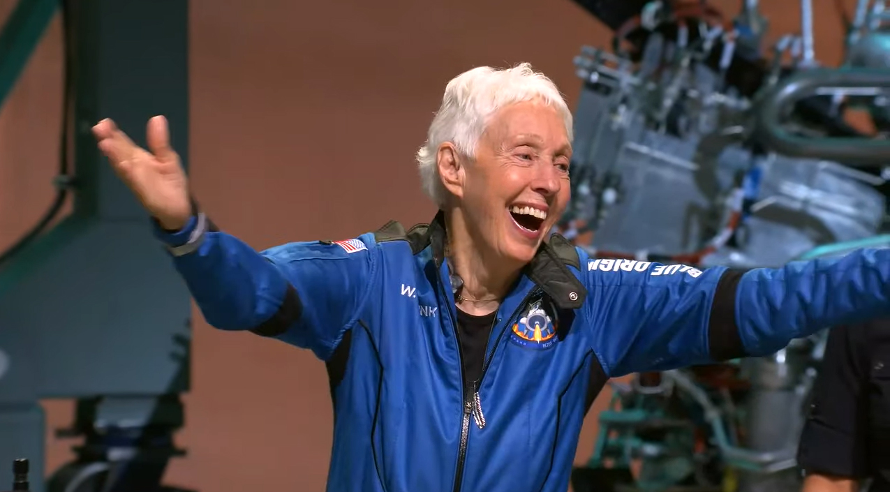 Mercury 13 aviation pioneer Wally Funk, 82, waves to a crowd after launching on Blue Origin's first crewed flight of the suborbital New Shepard rocket and capsule from Launch Site One near Van Horn, Texas on July 20, 2021.