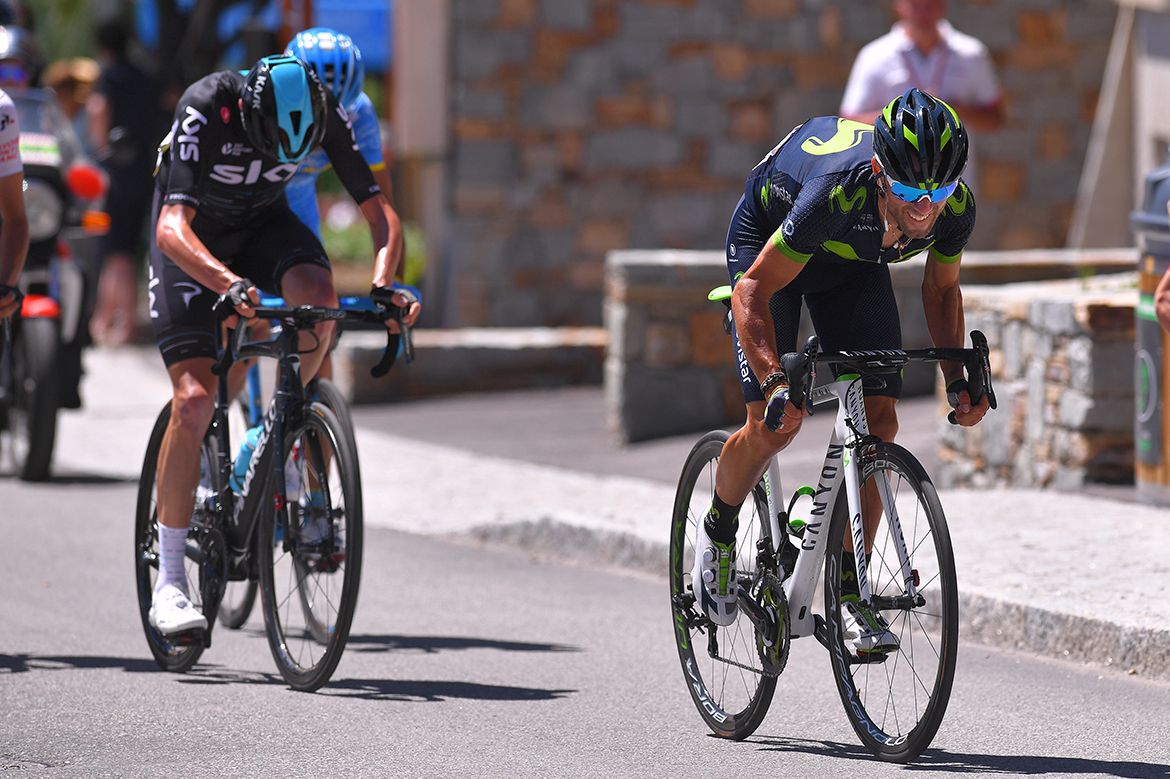 Alejandro Valverde attacks. Chris Froome watches his powermeter.