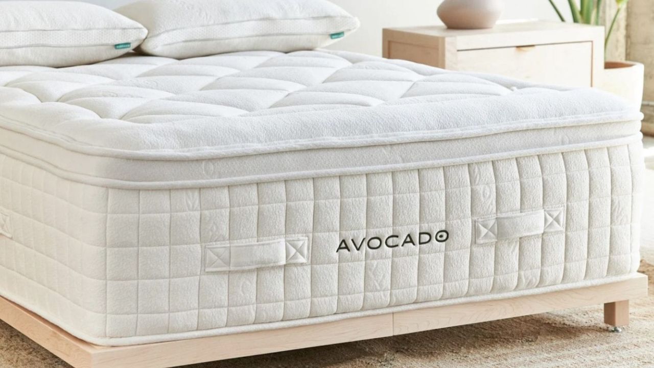 The Avocado Organic Luxury Mattress on a bed.