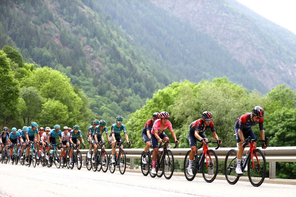 COGNE ITALY MAY 22 LR Richard Carapaz of Ecuador and Pink Leader Jersey Richie Porte of Australia and Nicolas Jonathan Castroviejo of Spain and Team INEOS Grenadiers lead the peloton during the 105th Giro dItalia 2022 Stage 15 a 177km stage from Rivarolo Canavese to Cogne 1622m Giro WorldTour on May 22 2022 in Cogne Italy Photo by Michael SteeleGetty Images