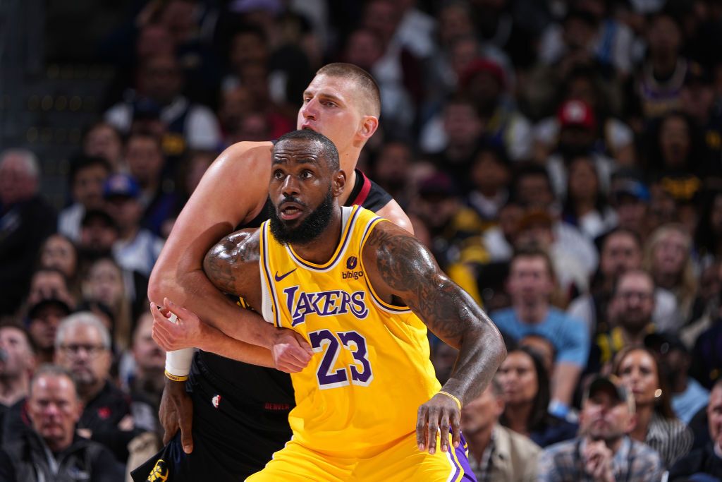 Nikola Jokic #15 of the Denver Nuggets and LeBron James #23 of the Los Angeles Lakers looks on during the game during Round 1 Game 2 of the 2024 NBA Playoffs