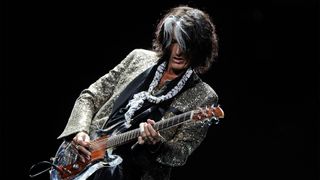 Joe Perry of Aerosmith performs during the opening night of the "Global Warming Tour" at the Target Center on June 16, 2012 in Minneapolis, Minnesota. 