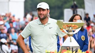 Scottie Scheffler with the FedEx Cup trophy