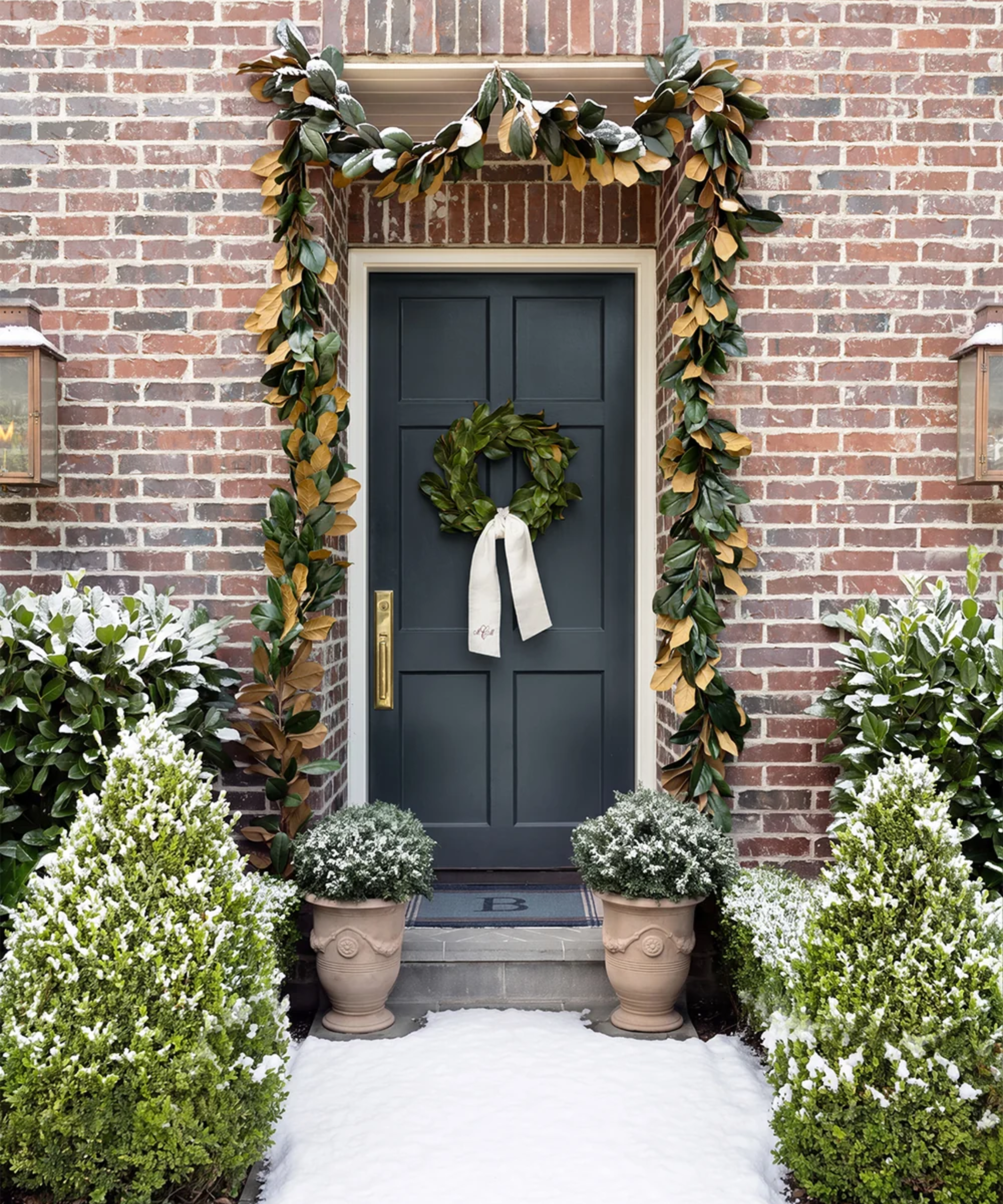 a porch decorated for Christmas