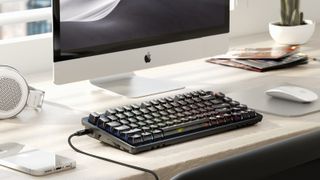 FiiO KB3 keyboard DAC on desk in front of iMac
