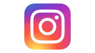 Instagram logo - a flat design of a retro camera on a pink, purple and orange gradient background
