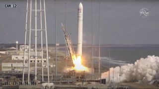 A Northrop Grumman Antares rocket carrying the uncrewed Cygnus NG-15 cargo ship launches from Pad 0A of NASA's Wallops Flight Facility on Wallops Island, Virginia on Feb. 20, 2021.