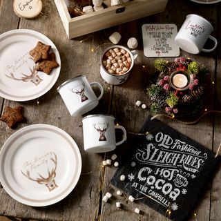 next christmas wreath and tableware with Christmas eve boxes treat plates mugs for hot chocolate and coasters