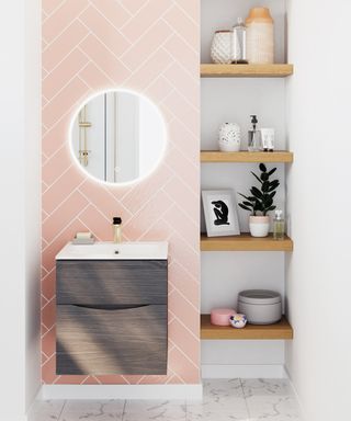 bathroom with pink tiles and wooden floating shelves
