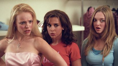 Two girls look angry and offended in a scene from "Mean Girls."