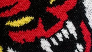 Hellfire Club Christmas Sweater logo closeup
