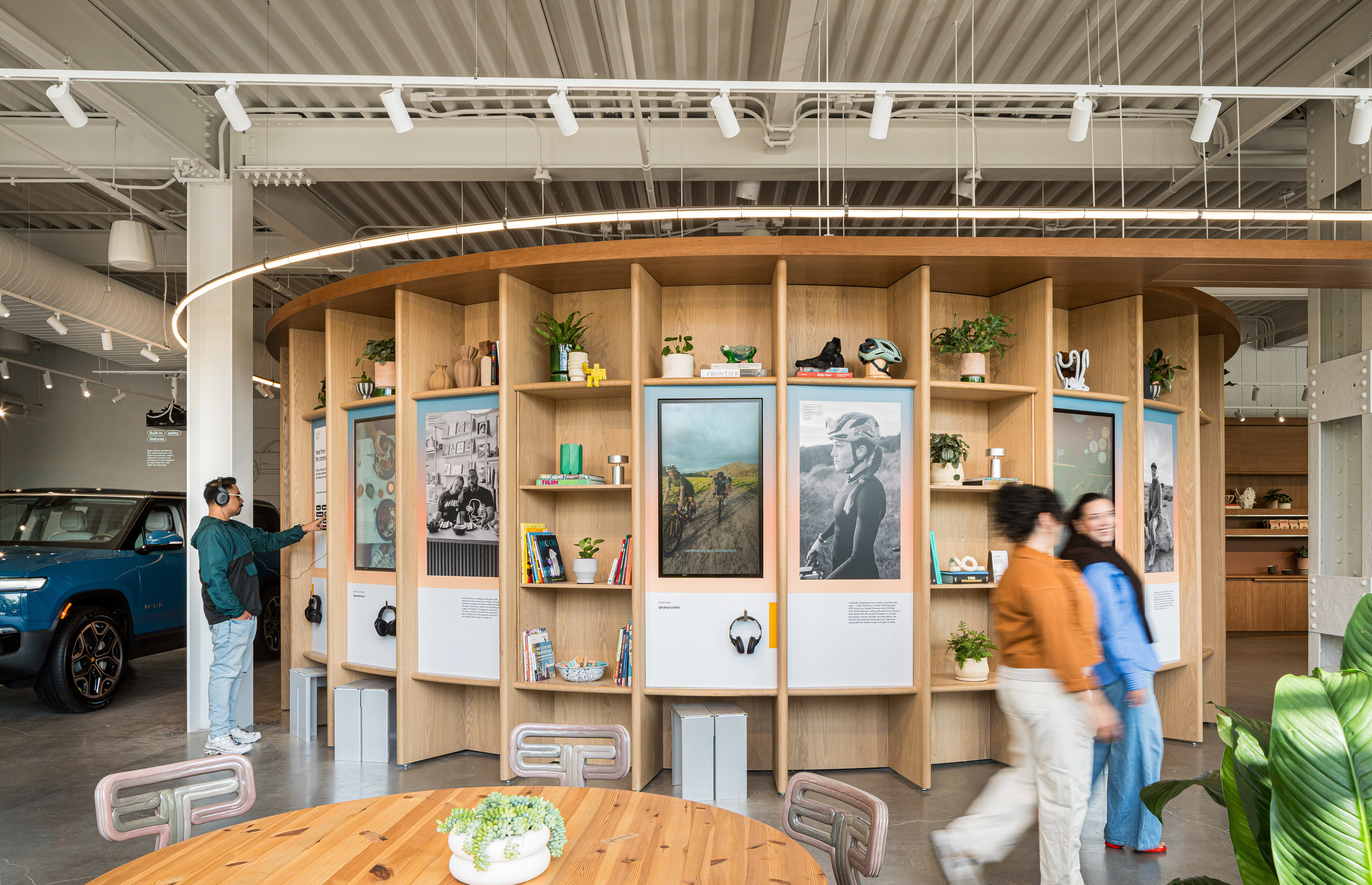 The exterior of the meeting pavilion is treated as shelves and storage